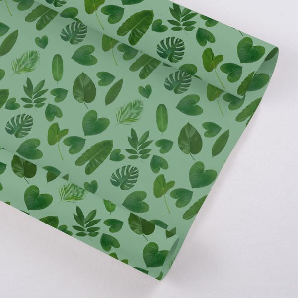 recycled gift wrap paper printed with tropical leaves